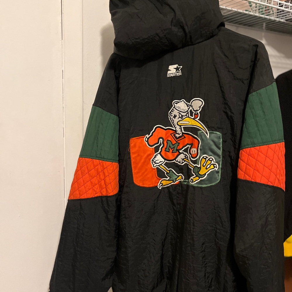 Starter Black Jacket with Green and Orange Accents LIKE NEW FROM 1996